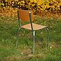 Stackable school chair with chromed steel legs