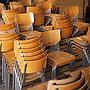 Stackable school chair with chromed steel legs
