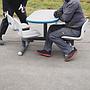 Bowling table with rotating plastic bucket seats by Brunswick