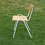 Stackable school chair with chromed tubular steel legs