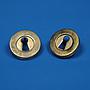 Door handle in solid brass with rosettes
