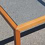 Square coffee table in laminated wood with glass table top
