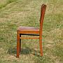 Chair in varnished oak (ca. 1960)