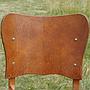 Chair in varnished oak (ca. 1960)