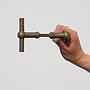 Door handle in solid brass