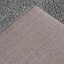 Square ottoman upholstered in grey or blue fabric