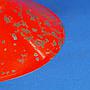 Hanging light with red enameled steel shade