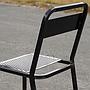 Stackable chair 'CH–07 A' in black square tubular steel by Ateliers J&J
