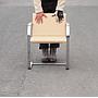 Armchair in chromed steel and synthetic leather