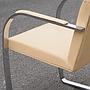 Armchair in chromed steel and synthetic leather