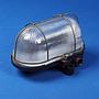 Caged wall/ceiling light with bakelite base, steel cage and textured glass diffuser