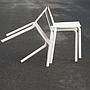 White stackable chair by Pierre-Emmanuel Vandeputte (with various coloured corners)