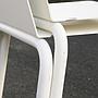 White stackable chair by Pierre-Emmanuel Vandeputte (with various coloured corners)