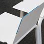 White stackable chair by Pierre-Emmanuel Vandeputte (with various coloured corners)