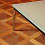 Coffee table in steel with frosted glass top