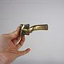 Window handle in brass (right)