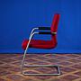 Red armchair by Martin Stoll