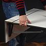 Wall mounted folding table