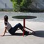 Round dining table 'AAT 20' by Hee Welling for HAY with red legs