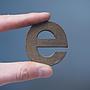 Letter 'e' in solid bronze by Jules Wabbes from the Générale de Banque (ca. 1970)