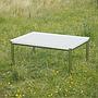 Coffee table with tempered glass top and aluminium base