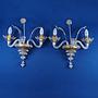 Pair of wall sconces in Murano glass and brass