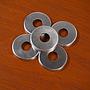 Door handle rosette in brushed stainless steel by Metafranc