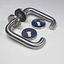 Door handle in stainless steel with key rosettes