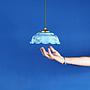 Hanging light with marbled blue glass diffuser