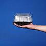 Caged wall/ceiling light with bakelite base, steel cage and textured glass diffuser